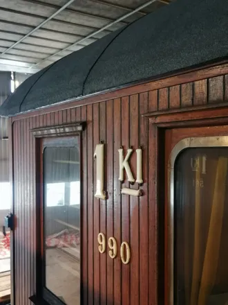 Hstoriske museum sitt togsett kledd i teak